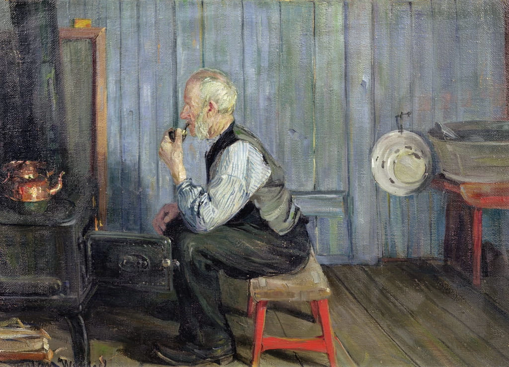 Uomo in cucina blu
